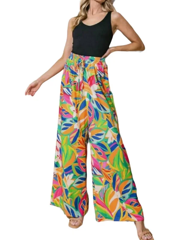 Pants for comfortable vacation wear -Tropical Patterned Flowy Pants In Tangerine Abstract